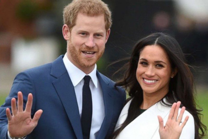 Pangeran Harry dan istrinya Meghan Markle