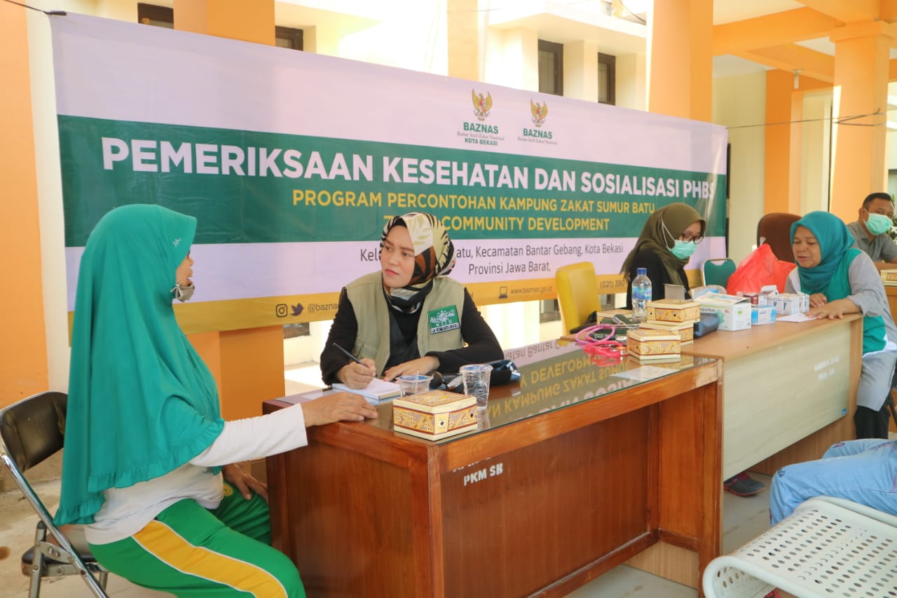 sosialisasi perilaku PHBS dan pemeriksaan serta pengobatan gratis di Puskesmas Sumur Batu